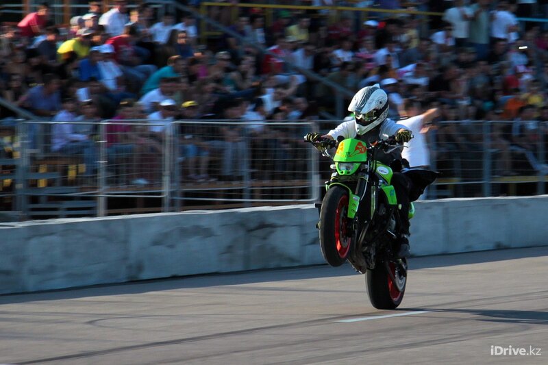 Motorcycle stunt on a track