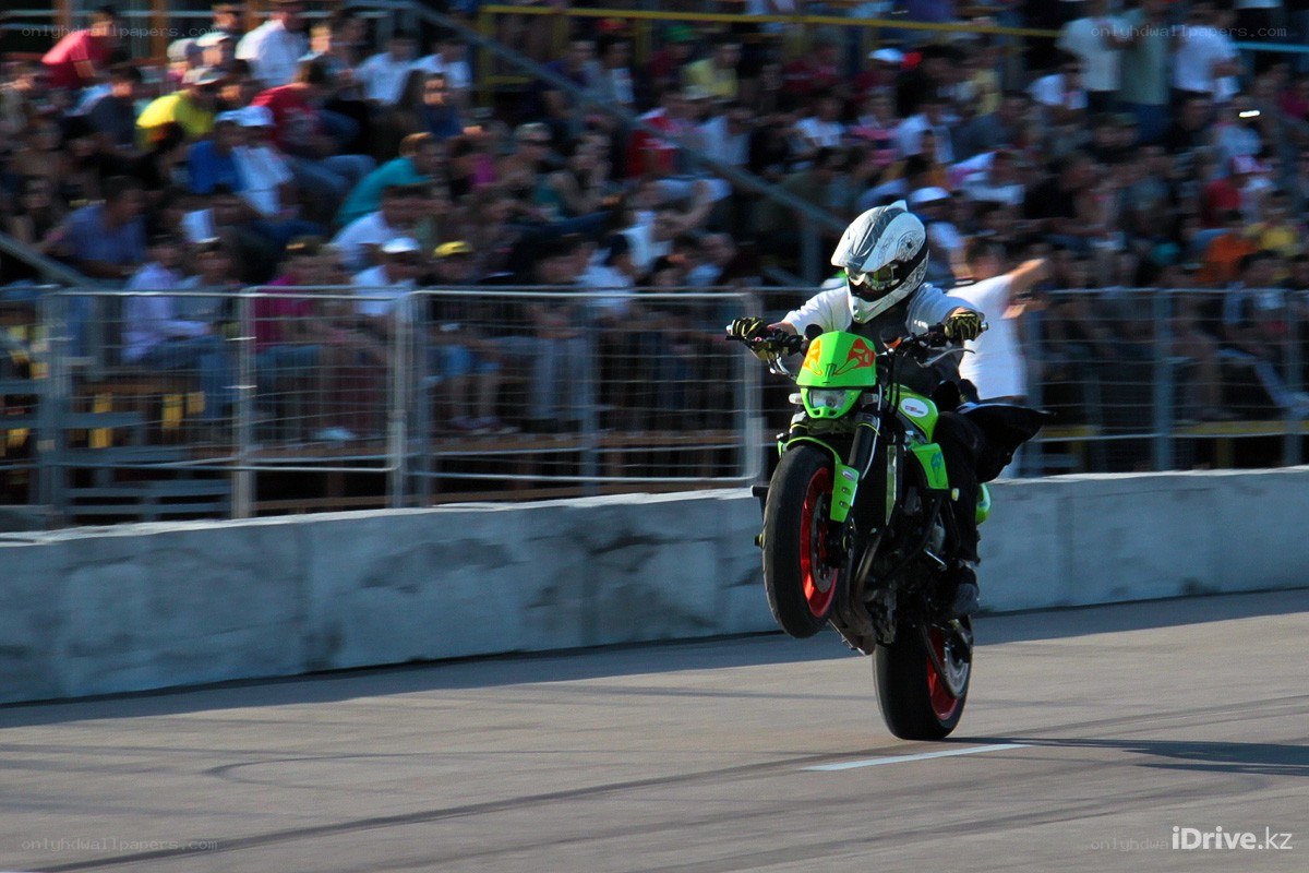 Motorcycle stunt on a track