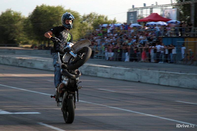 Motorcycle stunt on a track