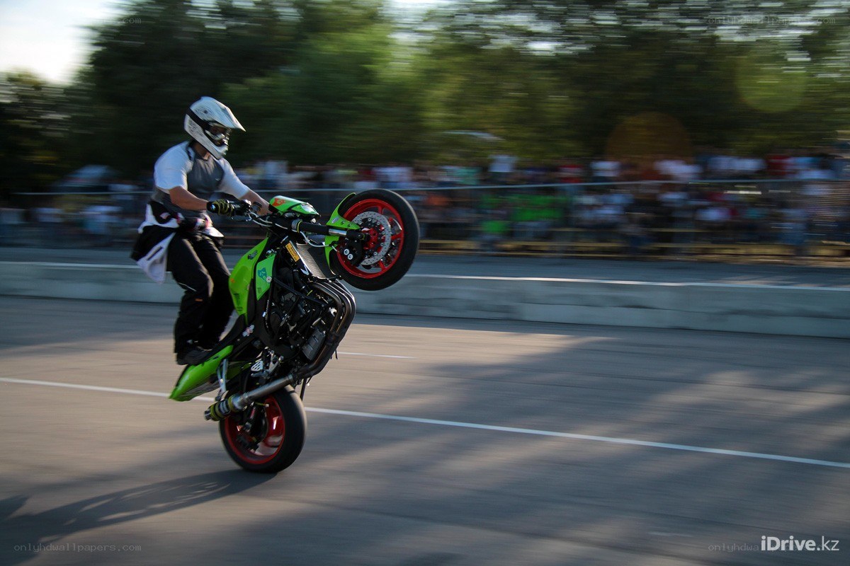Motorcycle stunt on track