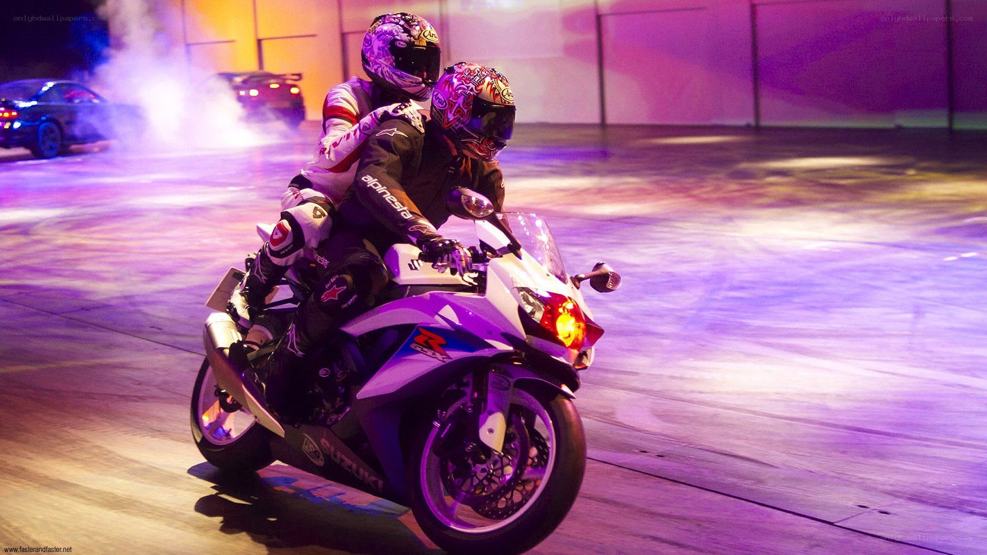 Motorcycle stunt performance at night