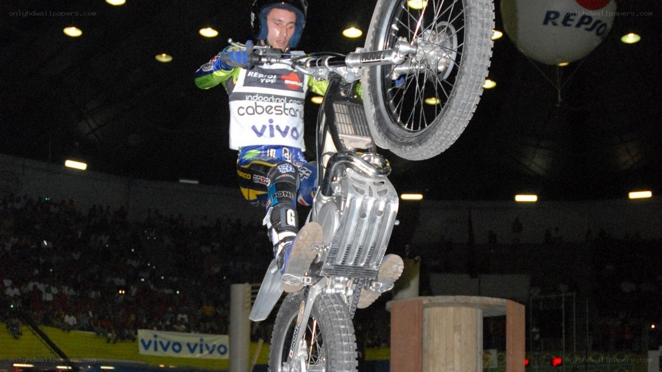 Motorcycle stunt performer in action