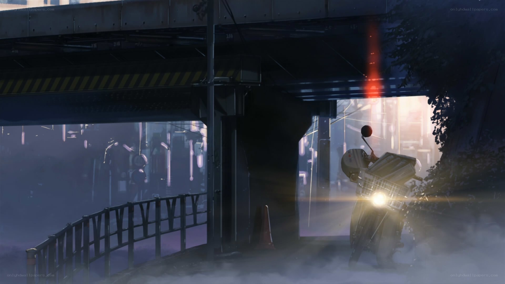 motorcycle under overpass at dusk