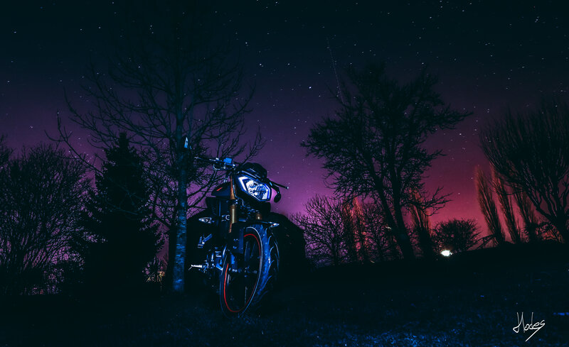 Motorcycle under Starry Sky