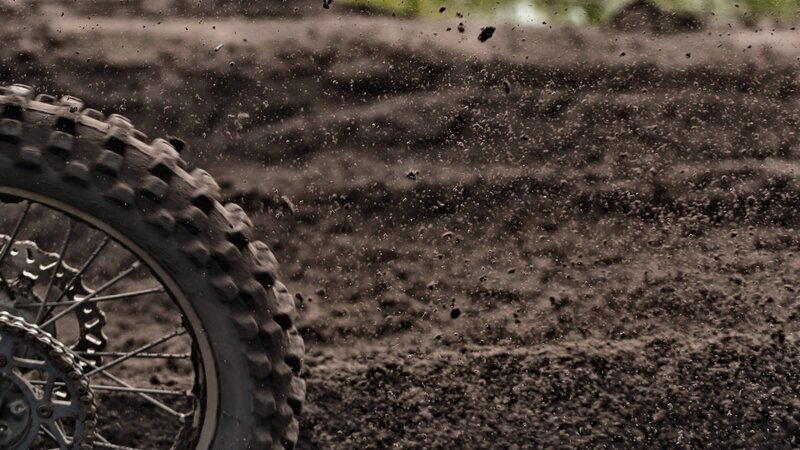 Motorcycle Wheel Kicking Dirt