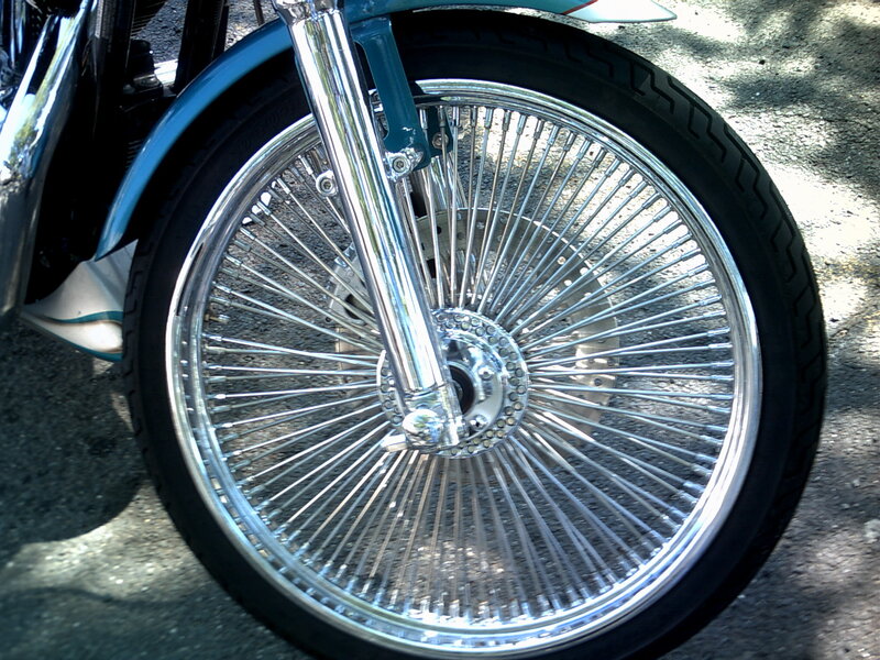 motorcycle wheel with spoked rim