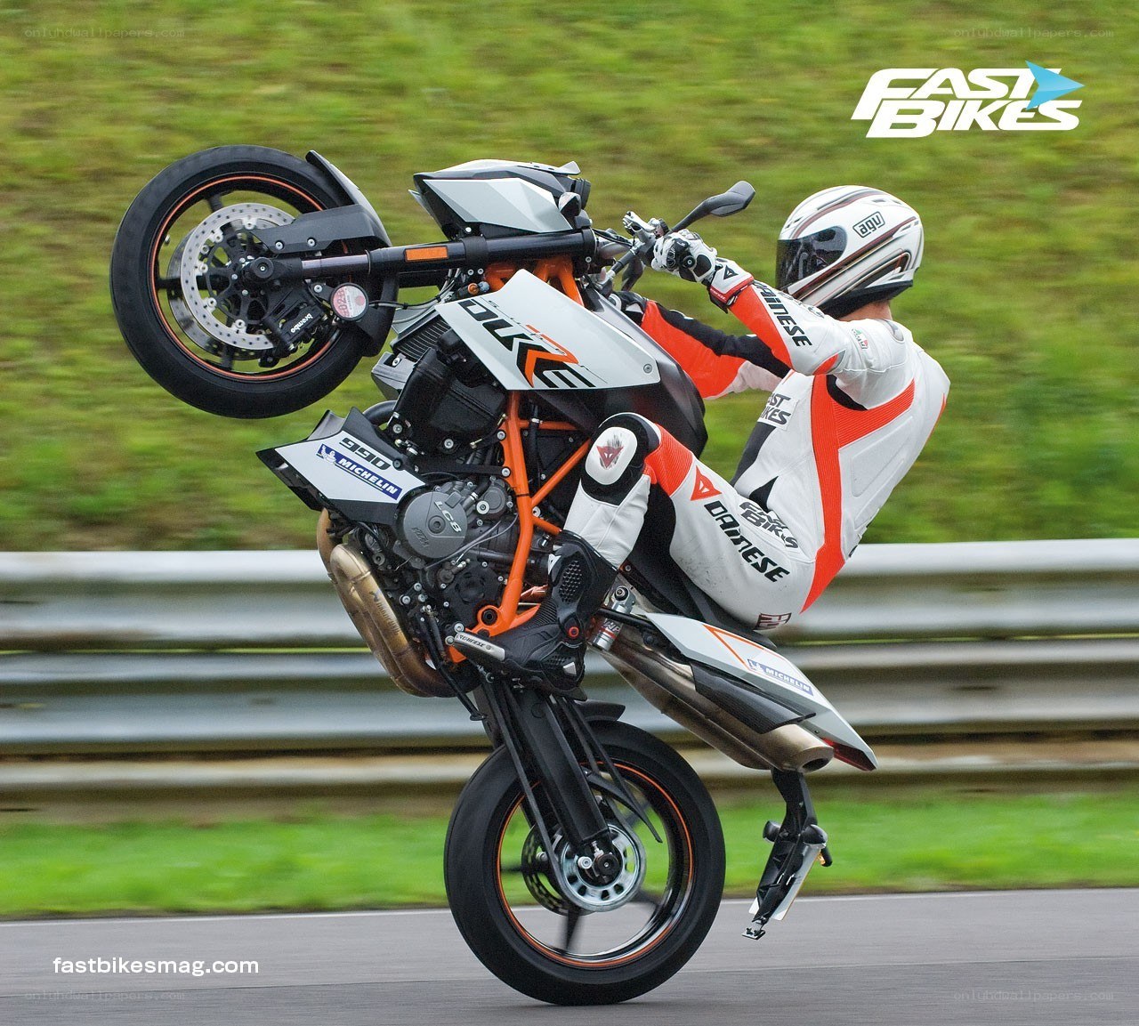 motorcycle wheelie on track