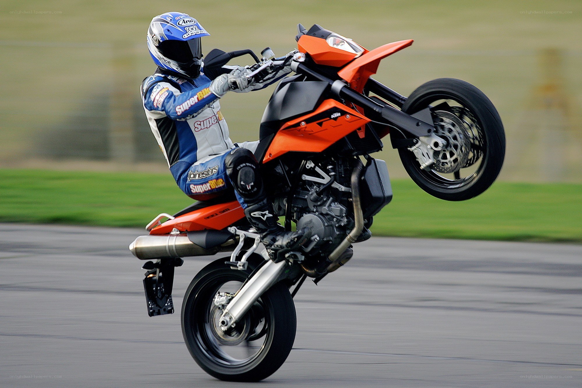 motorcycle wheelie on track