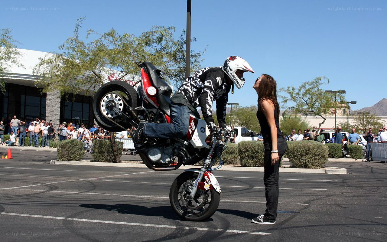 Motorcycle wheelie stunt performance
