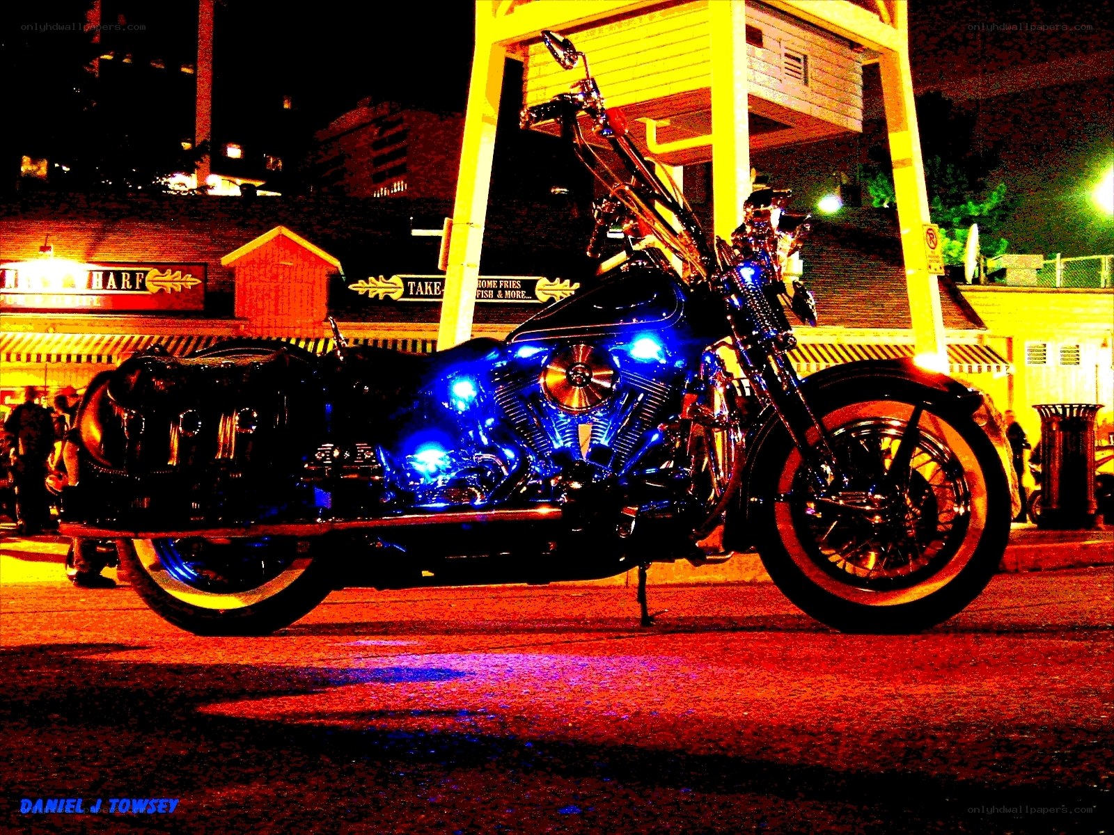 Motorcycle with blue lights at night