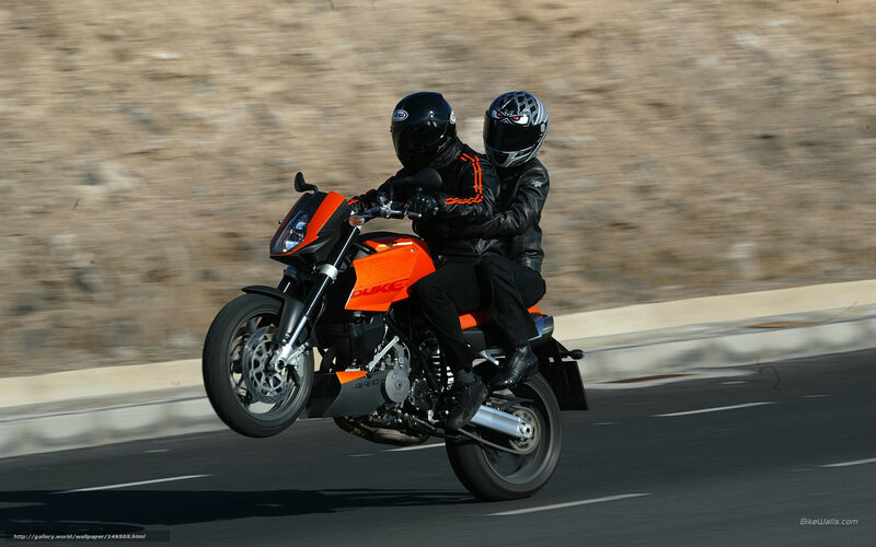 Motorcycle with passenger in motion