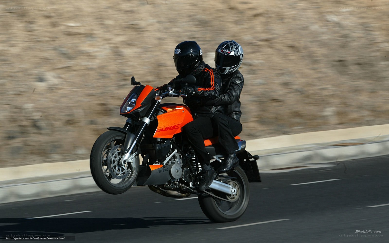 Motorcycle with passenger in motion