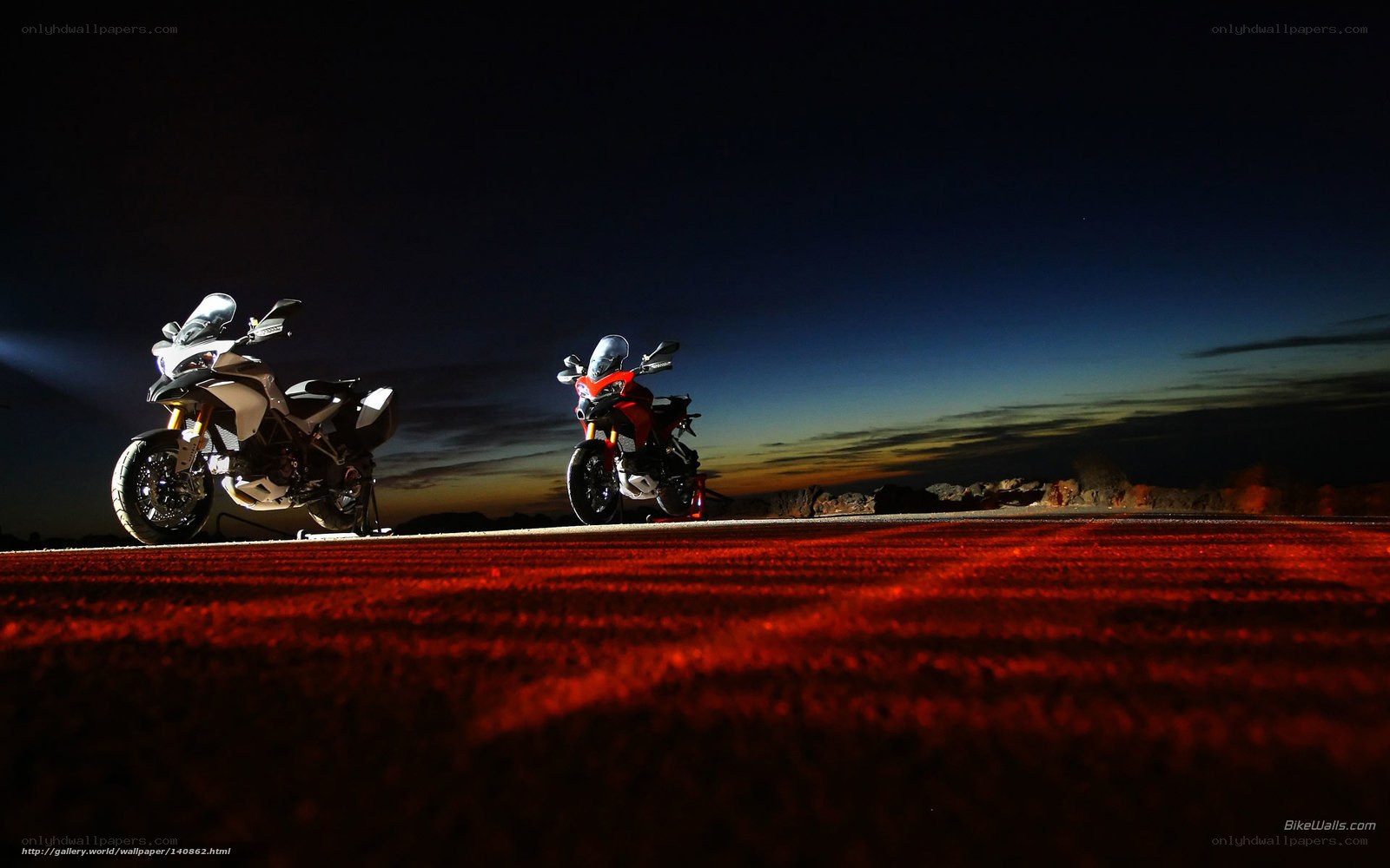 Motorcycles at dusk on a road