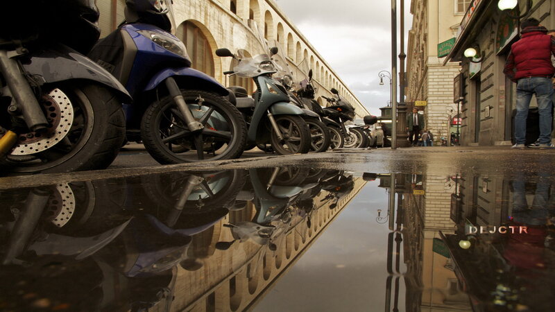 Motorcycles in a Puddle