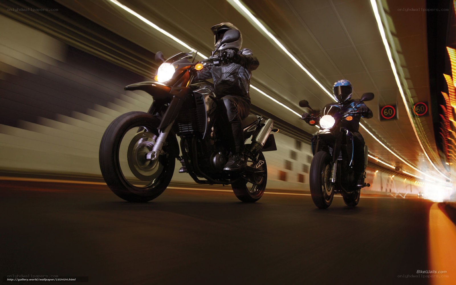 Motorcycles in a tunnel