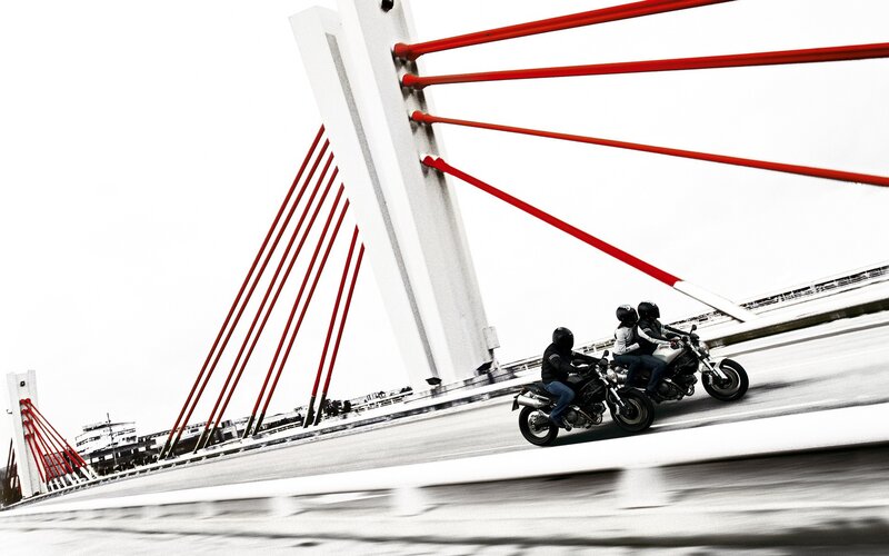Motorcycles on a cable-stayed bridge