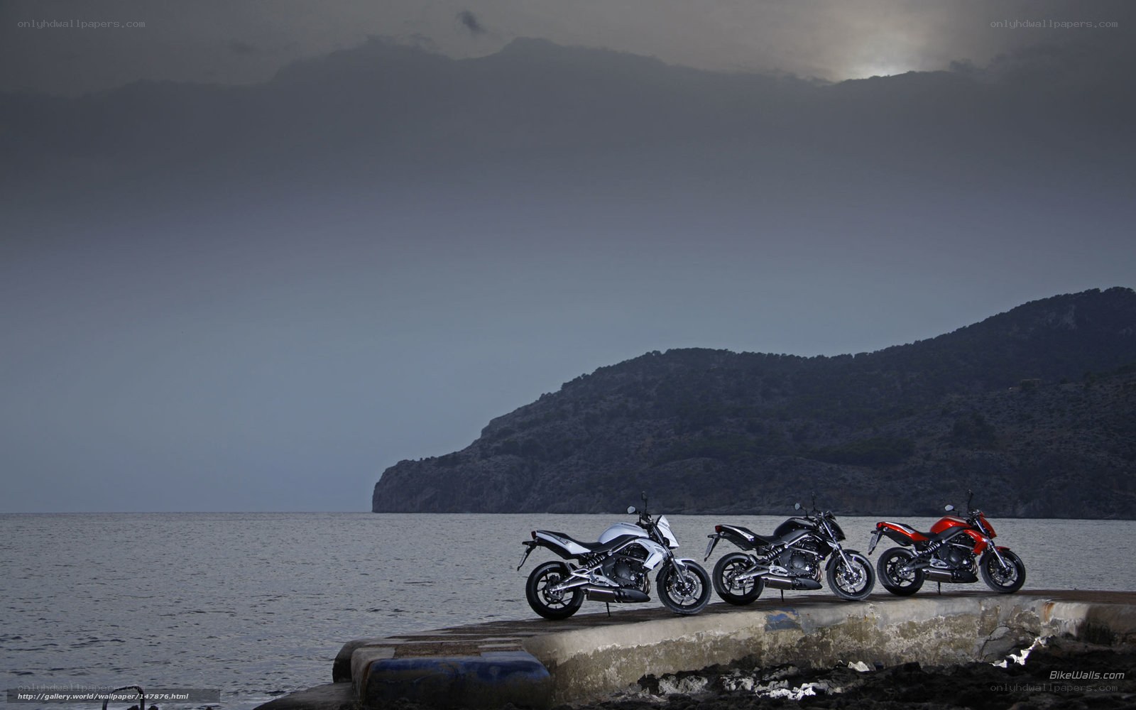Motorcycles on a coastal pier