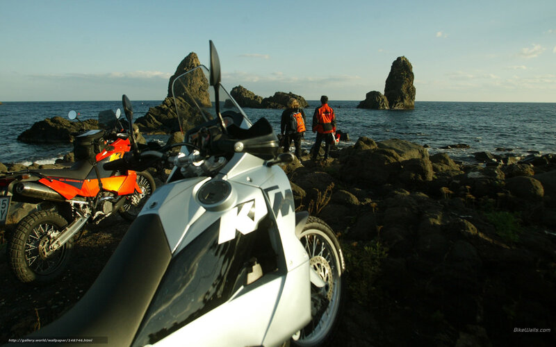 Motorcycles on a rocky coast