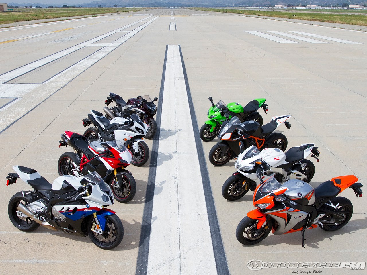 Motorcycles on an airfield