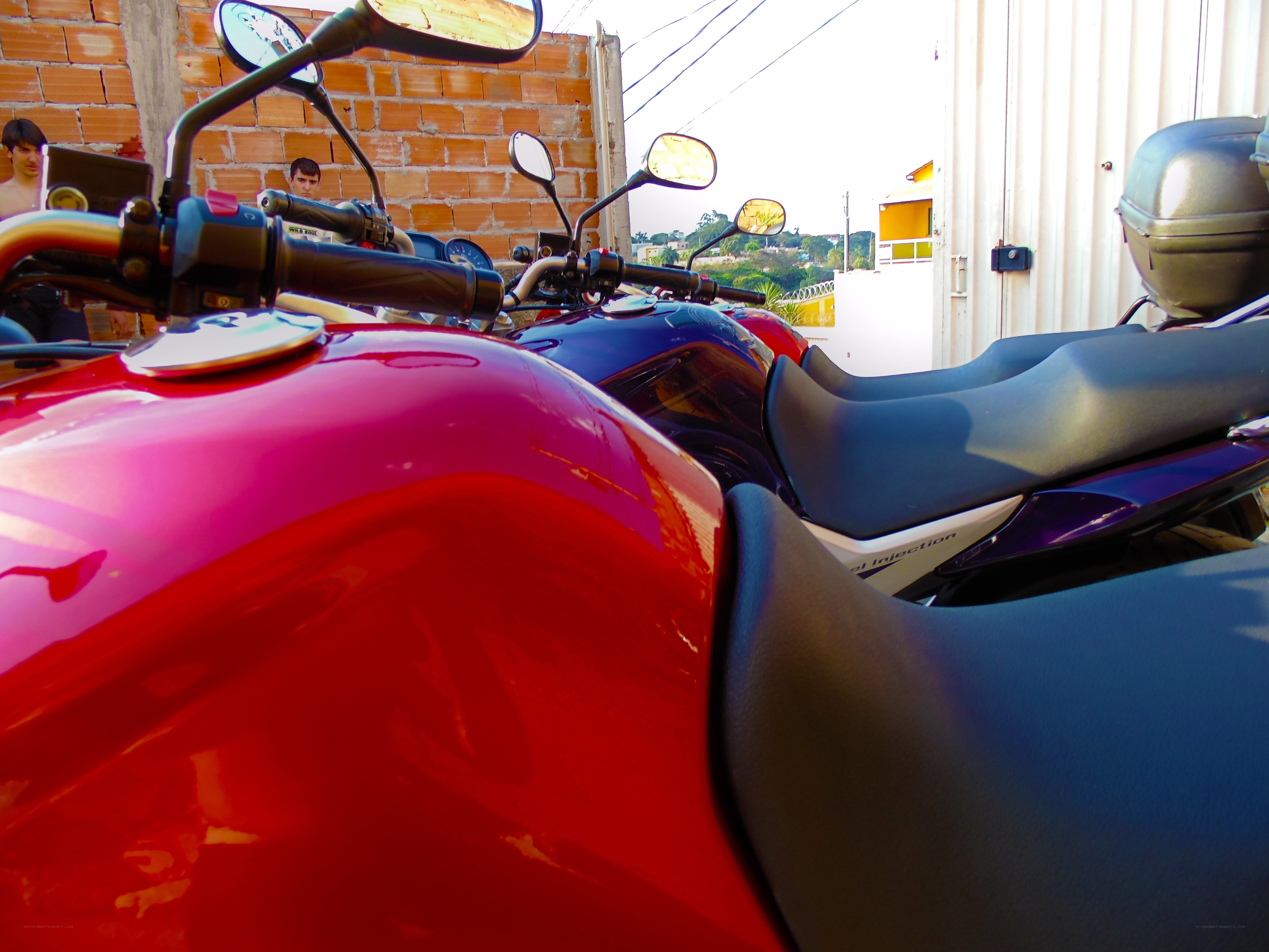 Motorcycles parked in a row