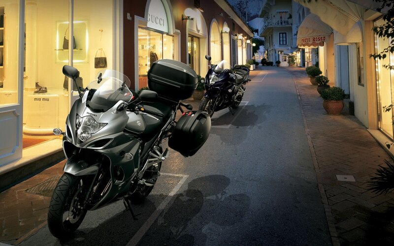 Motorcycles parked on a street