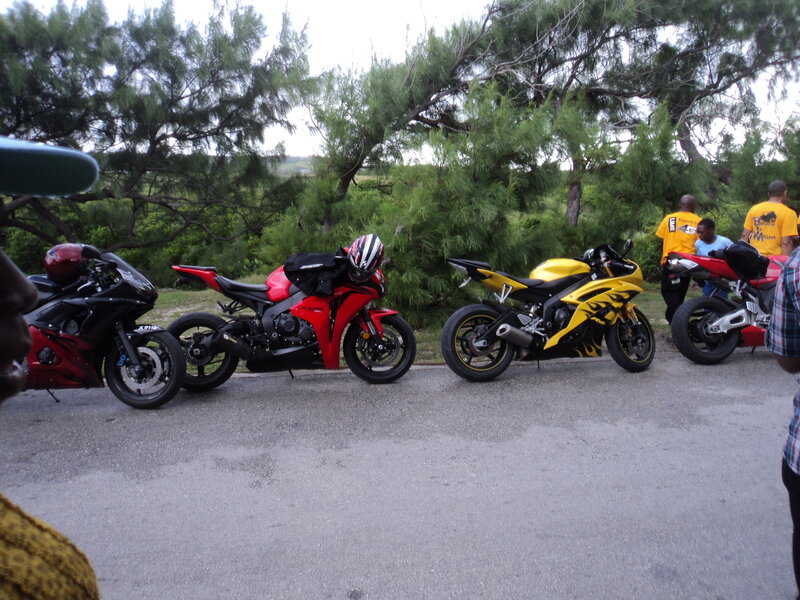 Motorcycles Parked on Road