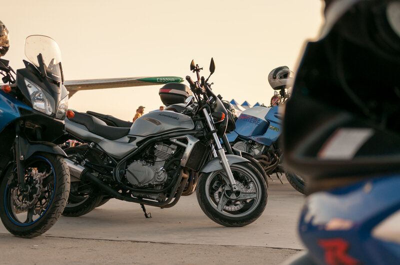 Motorcycles Parked on Tarmac