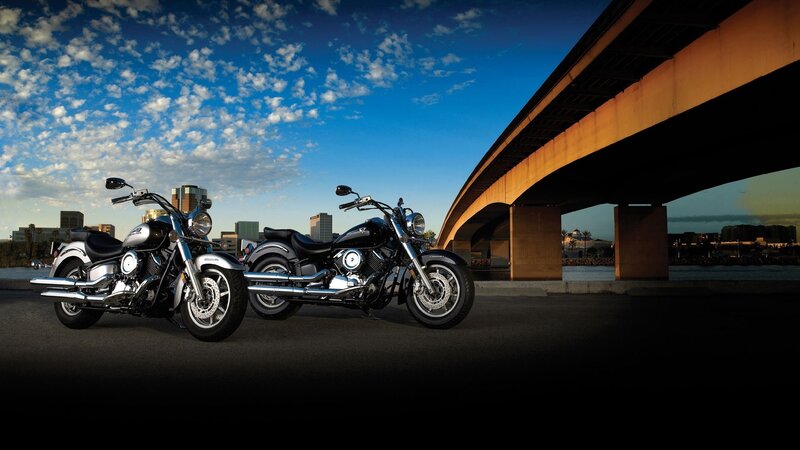 Motorcycles under a bridge