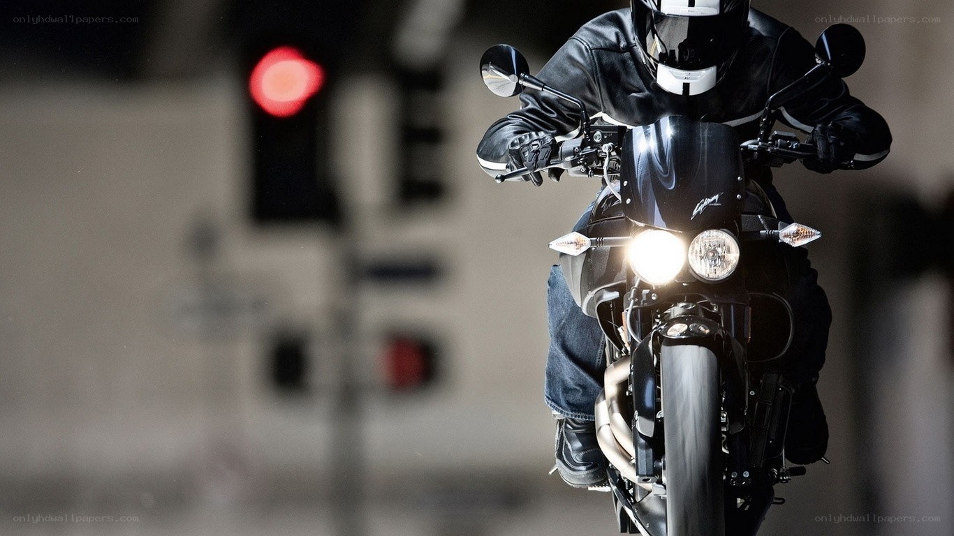 motorcyclist at red light