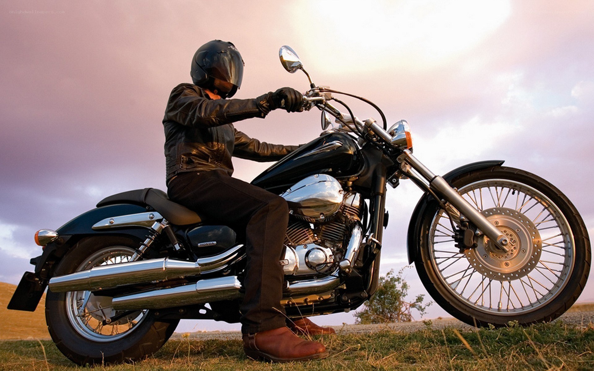 Motorcyclist at sunset