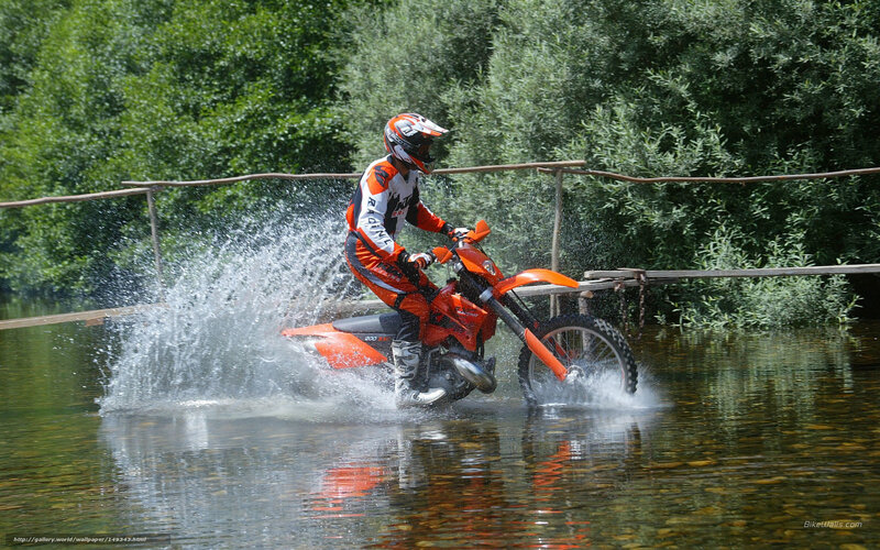 motorcyclist crossing river