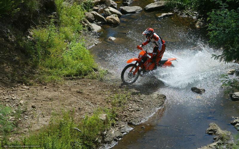 Motorcyclist Crossing Stream