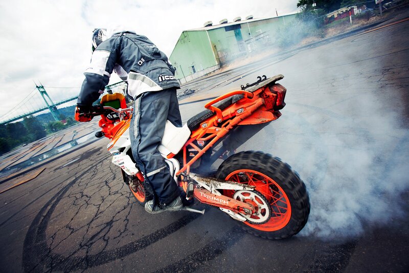 Motorcyclist Doing Burnout — Orange, Dramatic