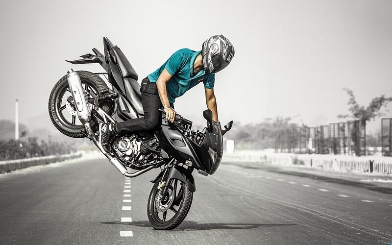 Motorcyclist Doing Wheelie — Black, Dramatic, Afternoon, Photograph, Helmet
