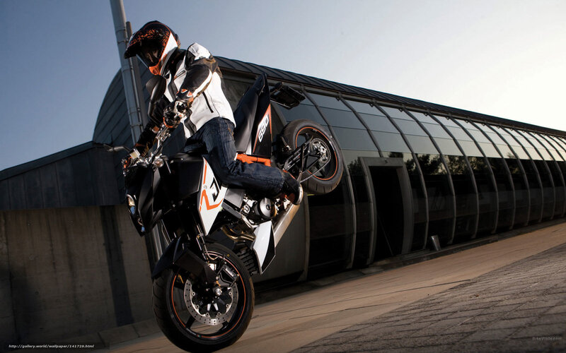 Motorcyclist Doing Wheelie — Black, Dramatic, Afternoon, Photograph