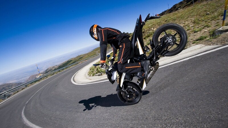 Motorcyclist Doing Wheelie