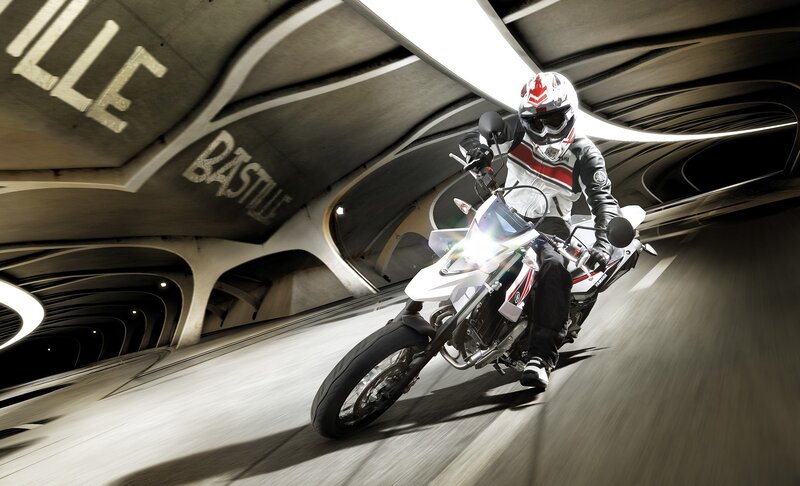 Motorcyclist in a futuristic tunnel