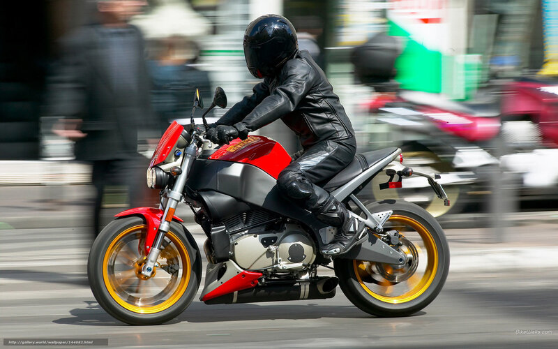 motorcyclist in black gear
