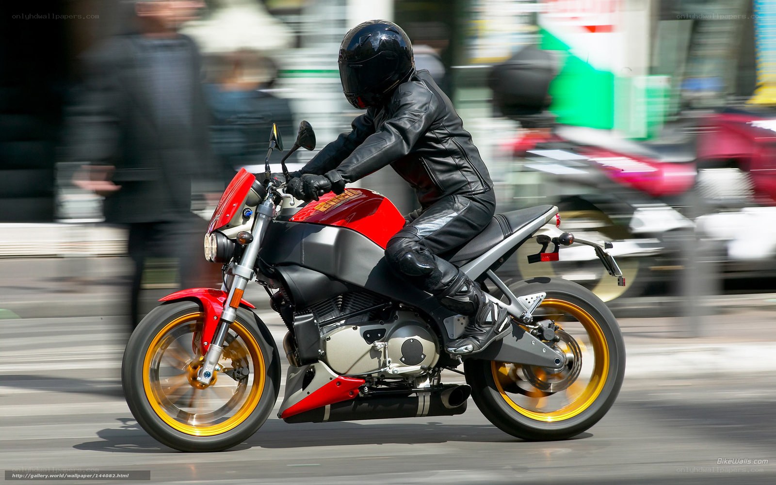 motorcyclist in black gear