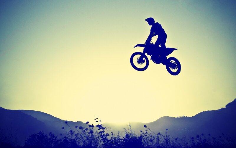 Motorcyclist in Mid-air — Blue, Dramatic, Sunset