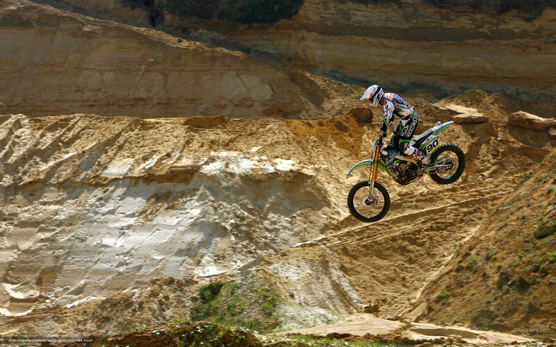 Motorcyclist in Mid-air — Brown