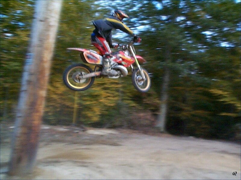 motorcyclist in mid-air jump