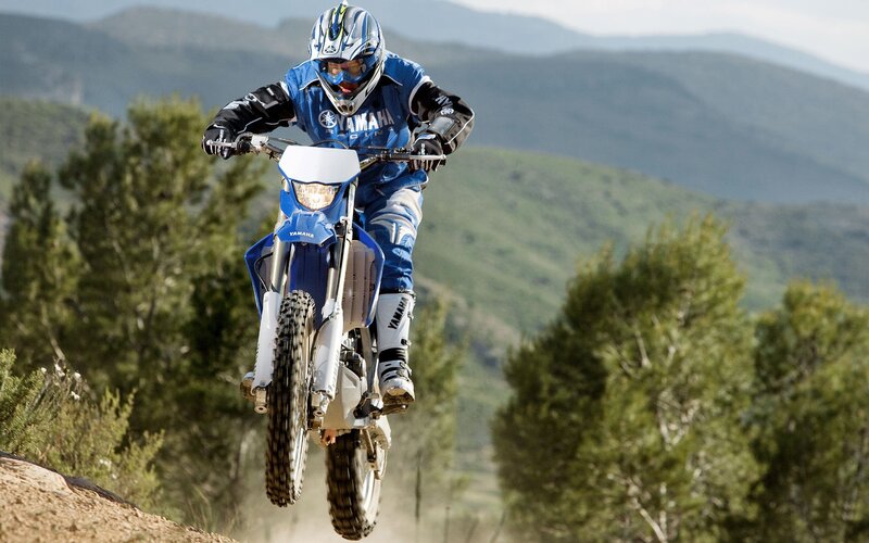 motorcyclist in mid-air jump