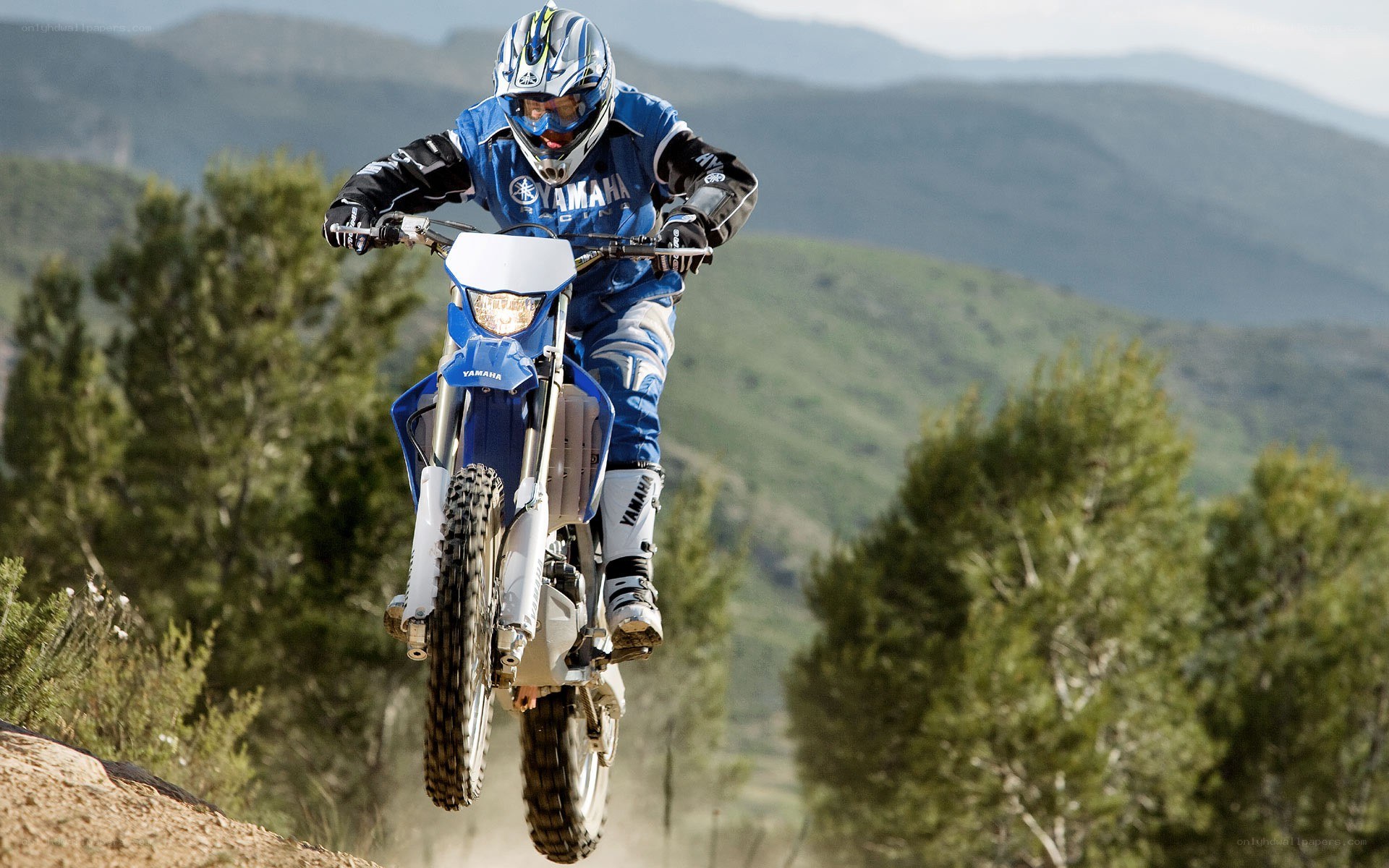 motorcyclist in mid-air jump