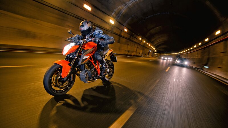 Motorcyclist in Tunnel — Orange