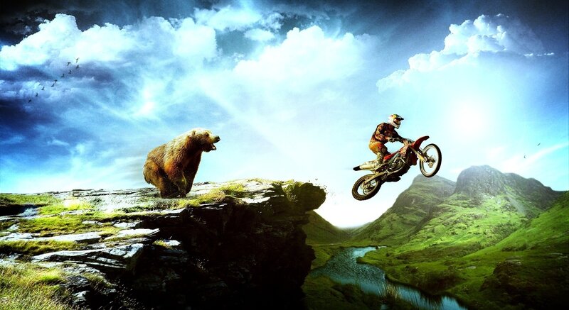 Motorcyclist Jumping over Bear