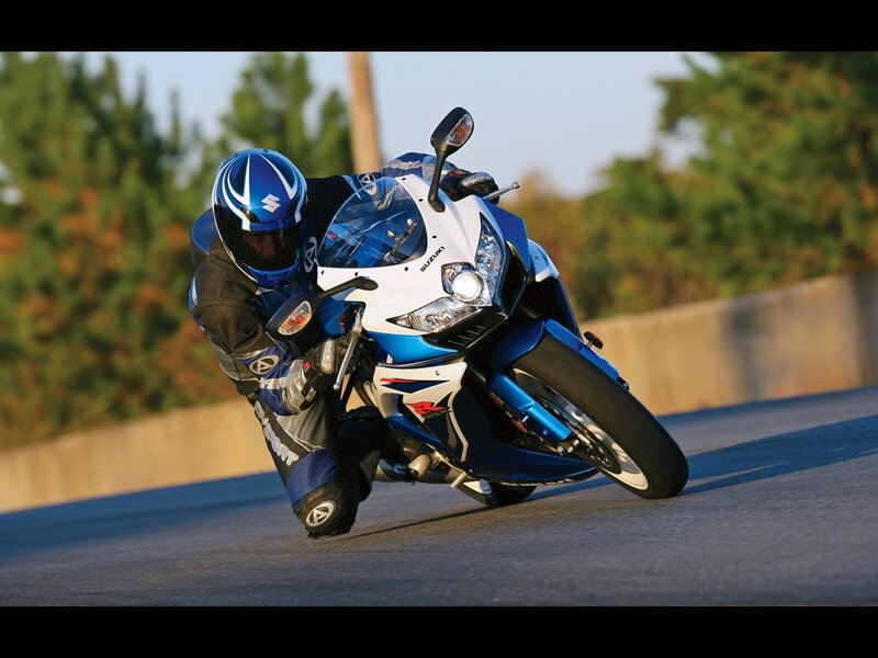 Motorcyclist leaning in a turn