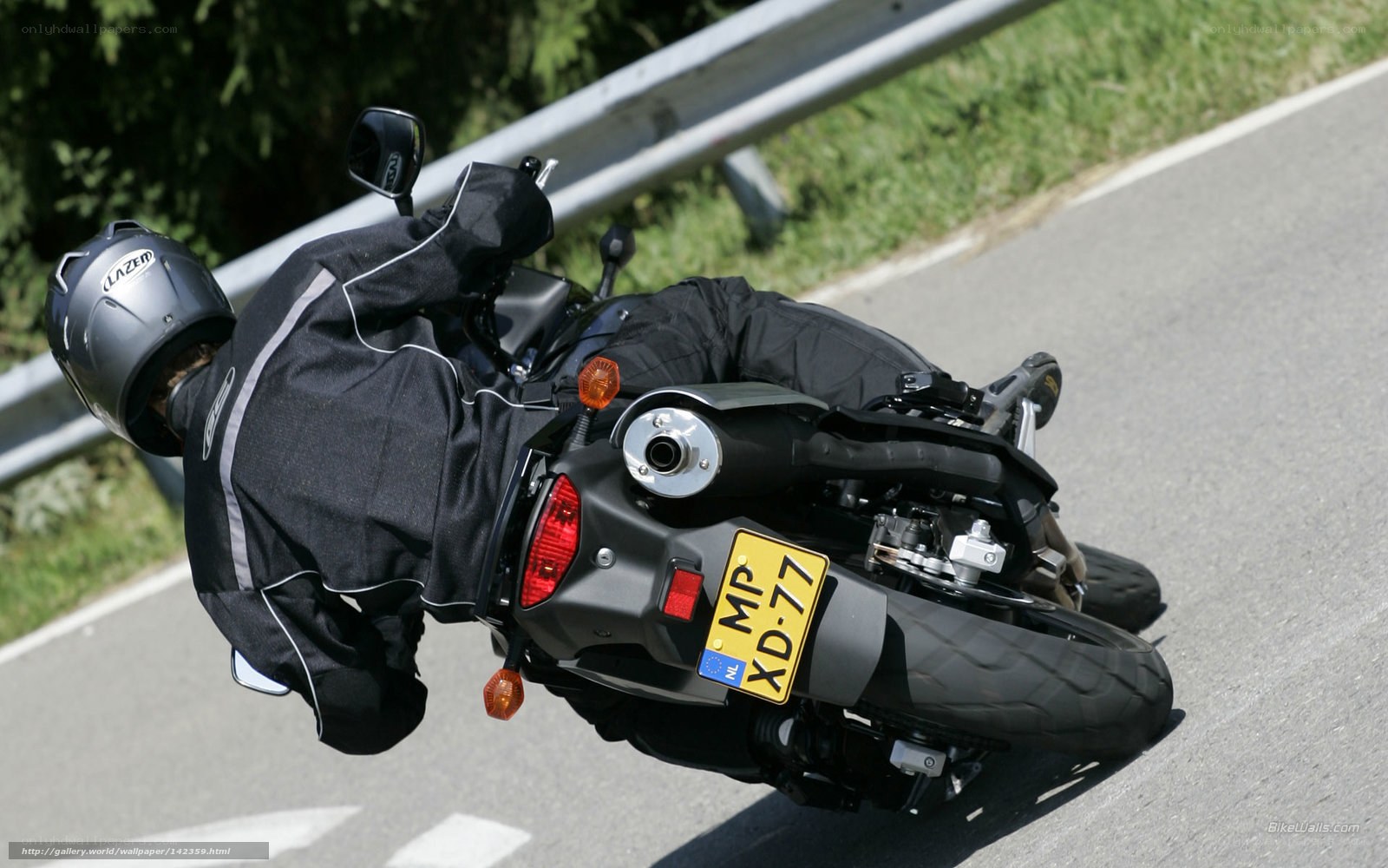motorcyclist leaning in a turn