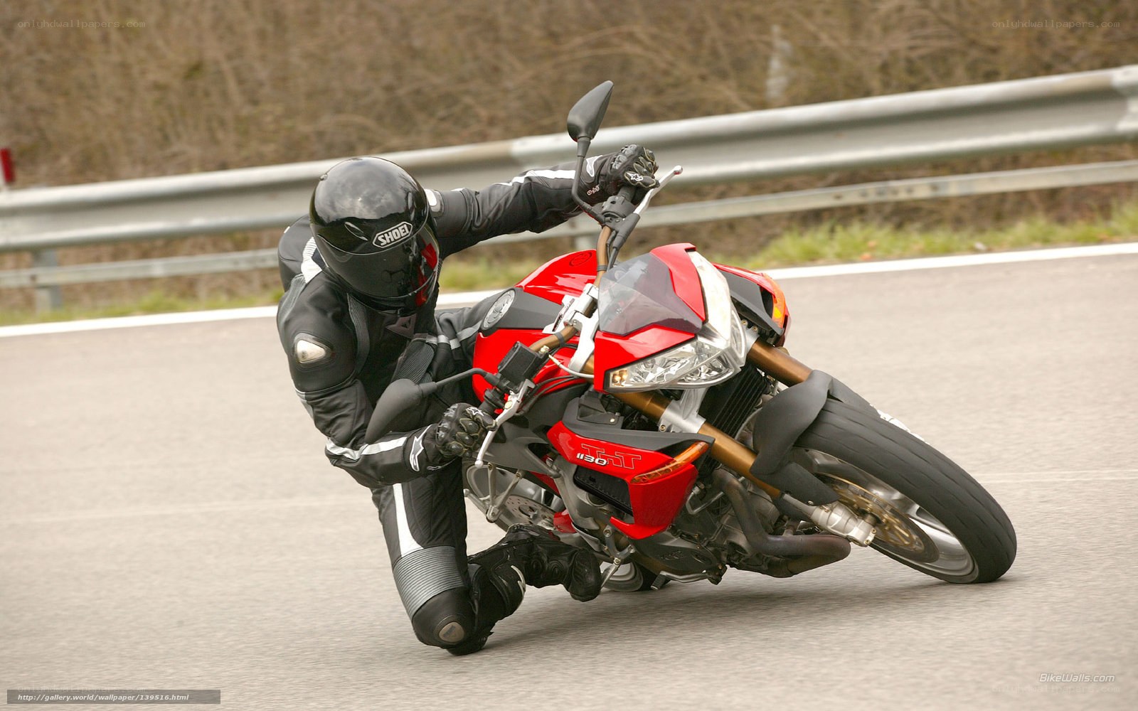 motorcyclist leaning in a turn
