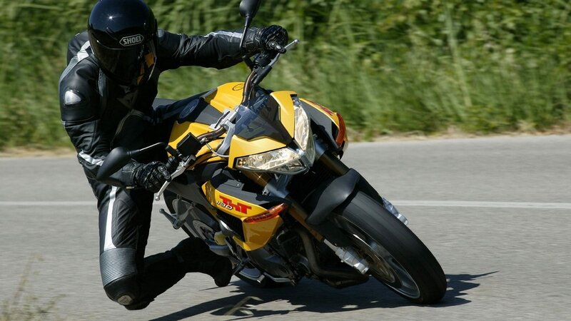 motorcyclist leaning in turn